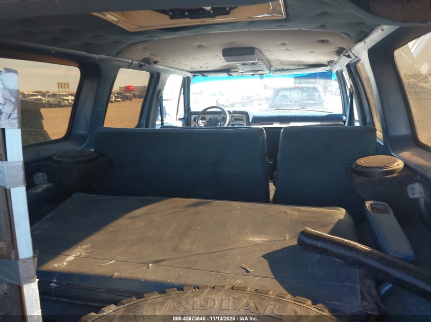 1986 GMC Suburban K1500 VIN: 1G5EK16L4GF503827 Lot: 43673645