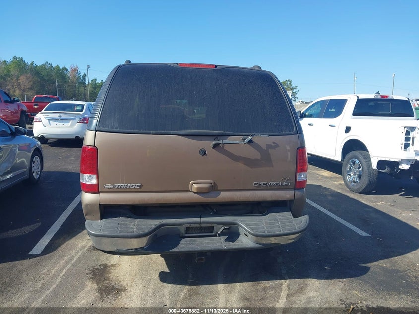 2004 Chevrolet Tahoe Lt VIN: 1GNEC13Z04J226219 Lot: 43675882