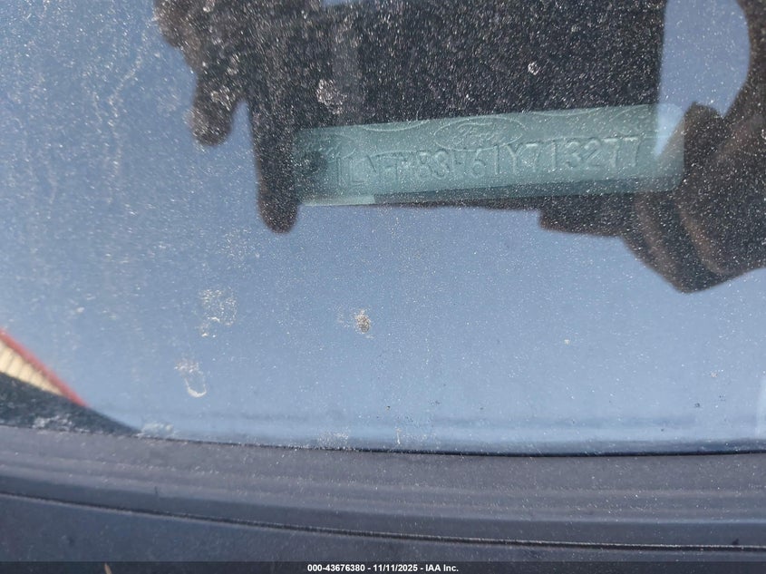 2001 Lincoln Town Car Cartier VIN: 1LNHM83W61Y713277 Lot: 43676380