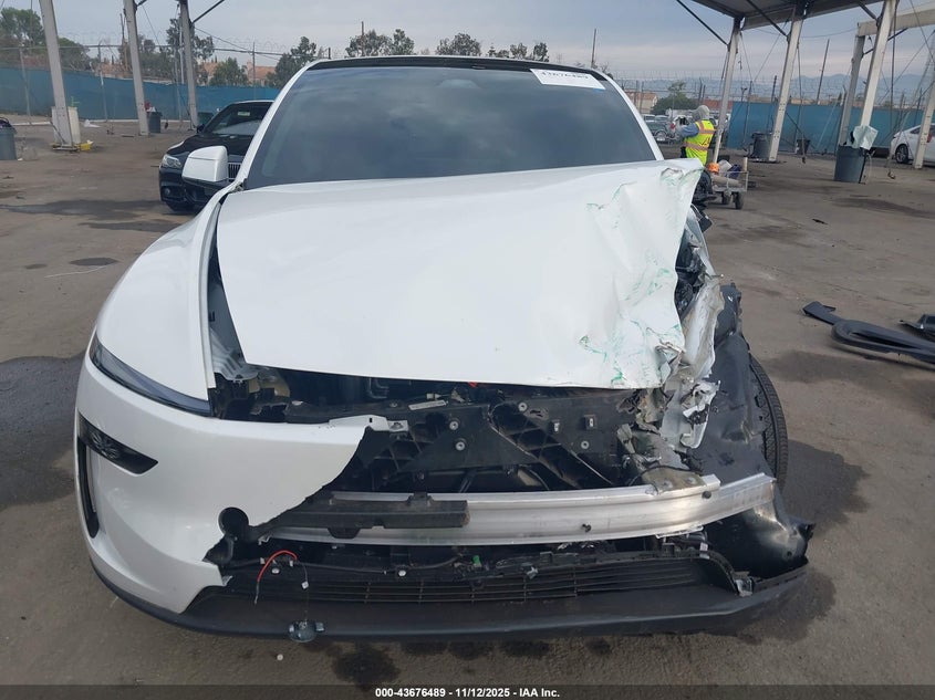 2026 Tesla Model Y Long Range Dual Motor All-Wheel Drive/Long Range Launch Series VIN: 7SAYGDEE8TF409950 Lot: 43676489