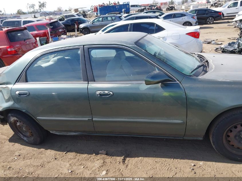1998 Mazda 626 Dx/Lx VIN: 1YVGF22C2W5691764 Lot: 43677590