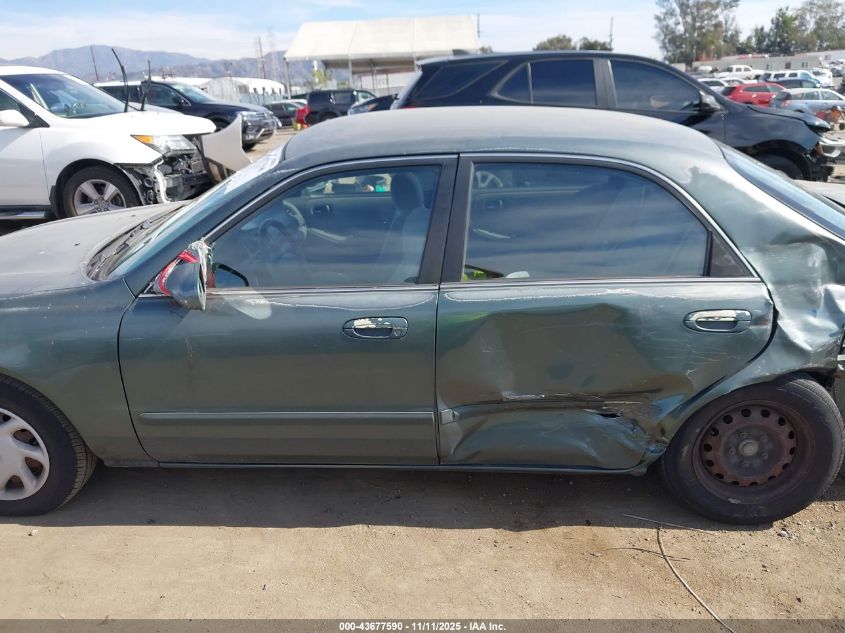 1998 Mazda 626 Dx/Lx VIN: 1YVGF22C2W5691764 Lot: 43677590