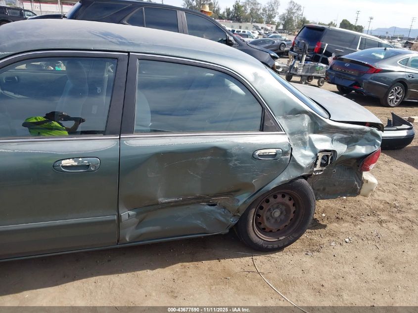 1998 Mazda 626 Dx/Lx VIN: 1YVGF22C2W5691764 Lot: 43677590