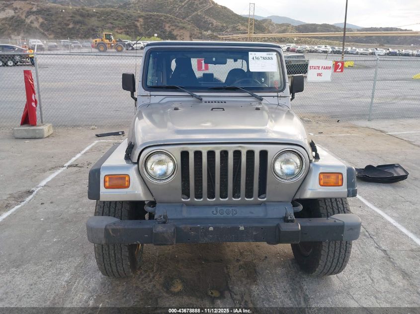 2000 Jeep Wrangler Sport VIN: 1J4FA49S7YP803999 Lot: 43678888