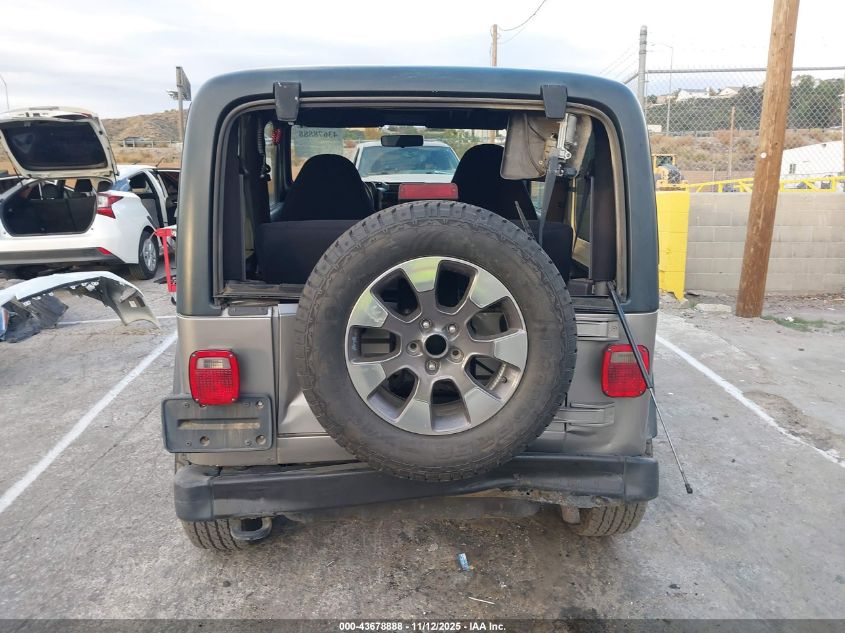 2000 Jeep Wrangler Sport VIN: 1J4FA49S7YP803999 Lot: 43678888