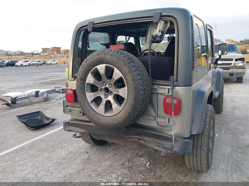 2000 Jeep Wrangler Sport VIN: 1J4FA49S7YP803999 Lot: 43678888