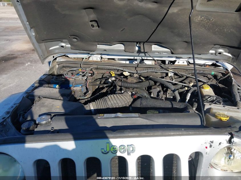 2007 Jeep Wrangler Unlimited Sahara VIN: 1J4GA59147L188433 Lot: 43679185