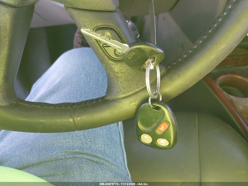 2003 GMC Envoy Slt VIN: 1GKDT13S932411552 Lot: 43679773