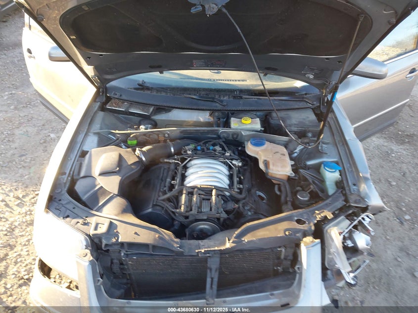 2003 Volkswagen Passat Glx VIN: WVWWH63B43E409824 Lot: 43680630