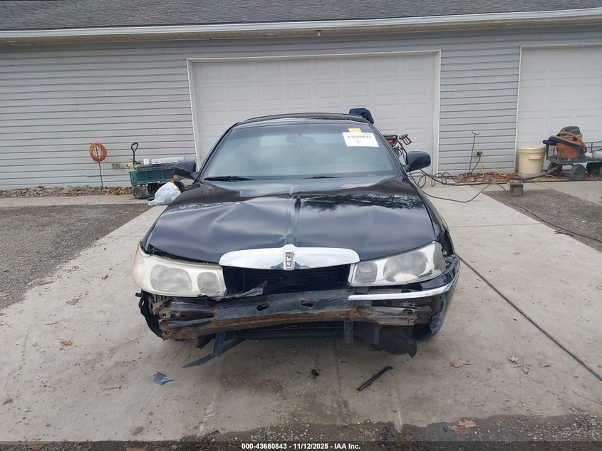 2001 Lincoln Town Car Signature VIN: 1LNHM82W91Y658583 Lot: 43680843