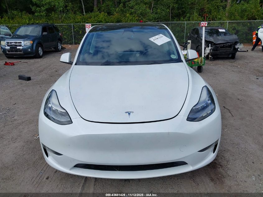 2023 Tesla Model Y Awd/Long Range Dual Motor All-Wheel Drive VIN: 7SAYGDEE2PA029764 Lot: 43681426