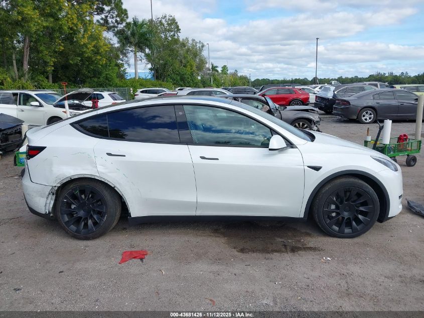 2023 Tesla Model Y Awd/Long Range Dual Motor All-Wheel Drive VIN: 7SAYGDEE2PA029764 Lot: 43681426