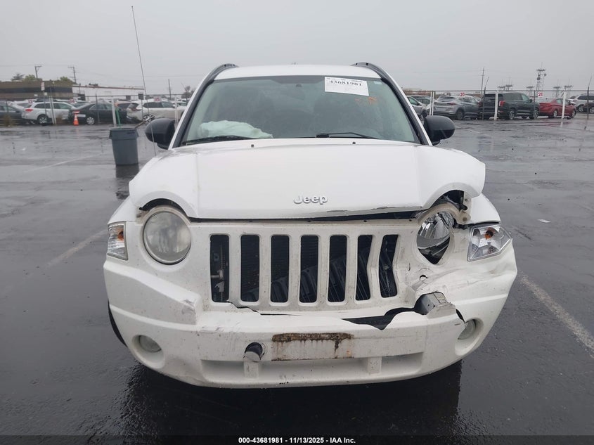 2009 Jeep Compass Sport VIN: 1J4FF47B29D205908 Lot: 43681981