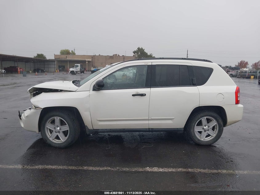 2009 Jeep Compass Sport VIN: 1J4FF47B29D205908 Lot: 43681981