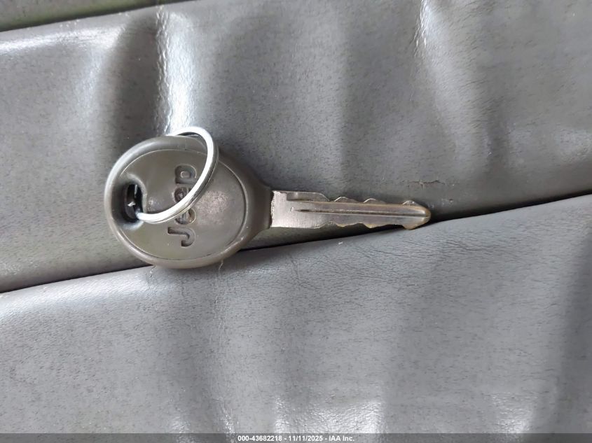 1999 Jeep Grand Cherokee Limited VIN: 1J4GW68N2XC597168 Lot: 43682218