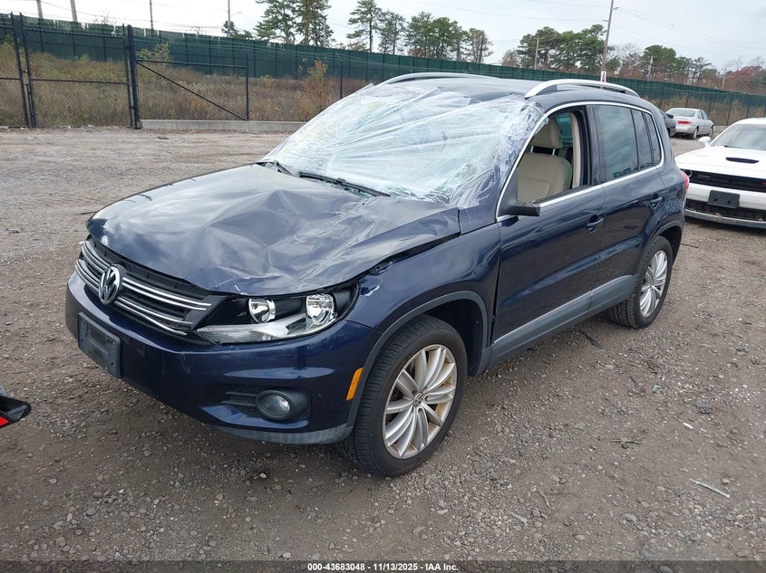 WVGBV3AXXEW502280 2014 VOLKSWAGEN TIGUAN photo no. 2