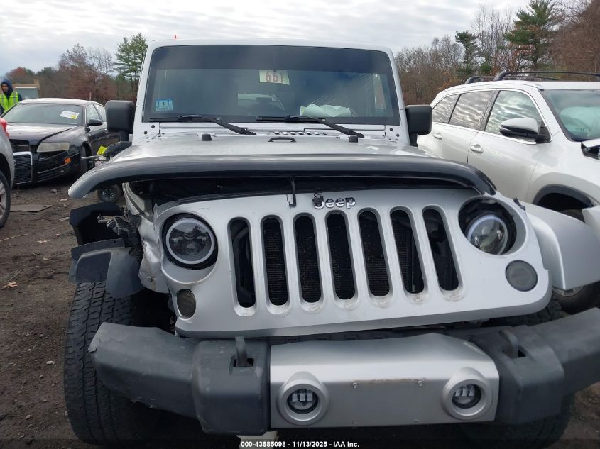 2009 Jeep Wrangler Unlimited Sahara VIN: 1J4GA591X9L750077 Lot: 43685098