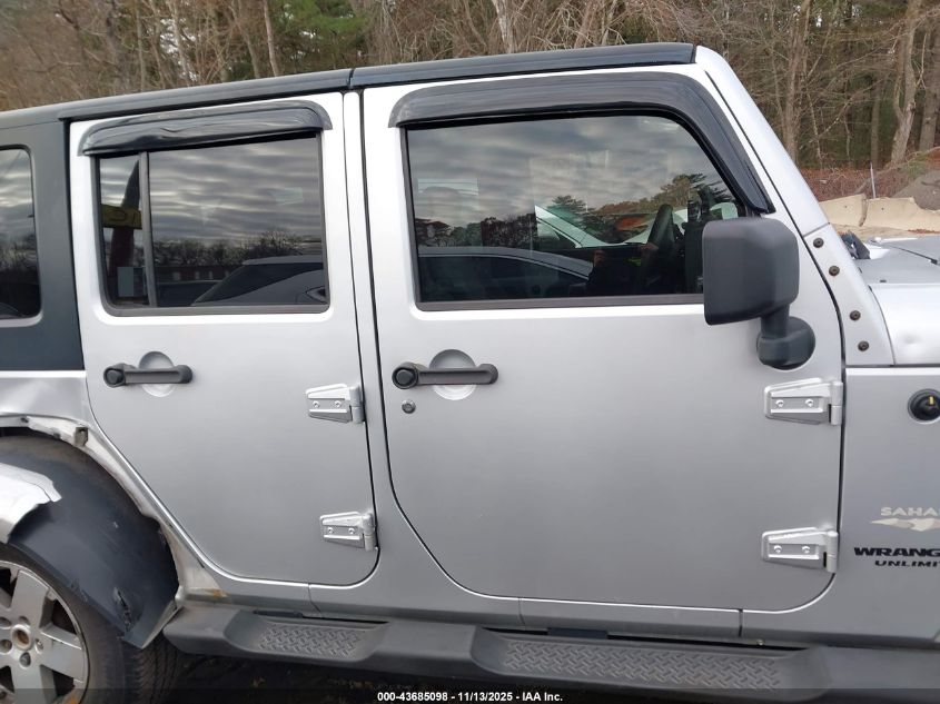 2009 Jeep Wrangler Unlimited Sahara VIN: 1J4GA591X9L750077 Lot: 43685098