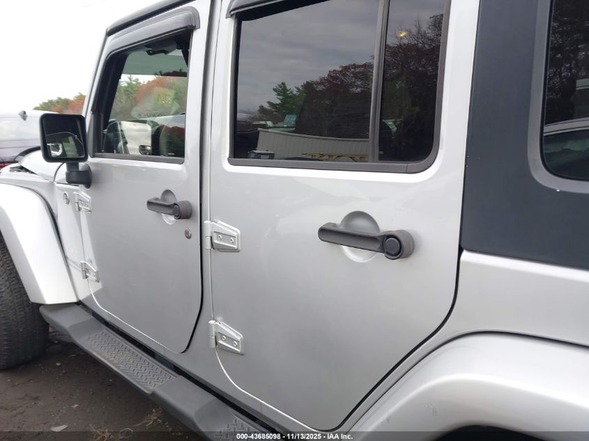 2009 Jeep Wrangler Unlimited Sahara VIN: 1J4GA591X9L750077 Lot: 43685098