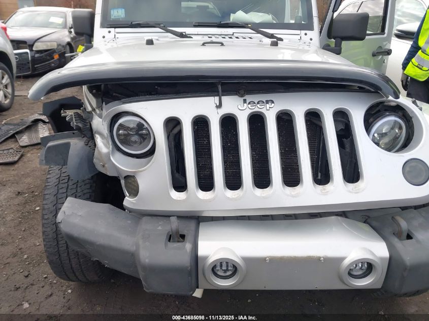 2009 Jeep Wrangler Unlimited Sahara VIN: 1J4GA591X9L750077 Lot: 43685098