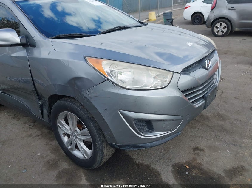 KM8JU3ACXBU212141 2011 HYUNDAI TUCSON photo no. 6