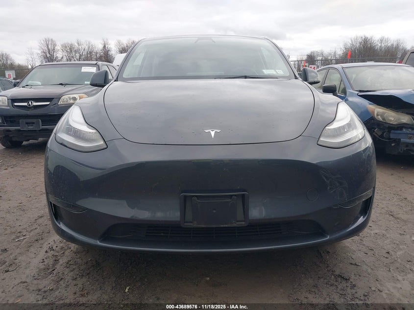 2023 Tesla Model Y Awd/Long Range Dual Motor All-Wheel Drive VIN: 7SAYGDEE1PA067194 Lot: 43689576