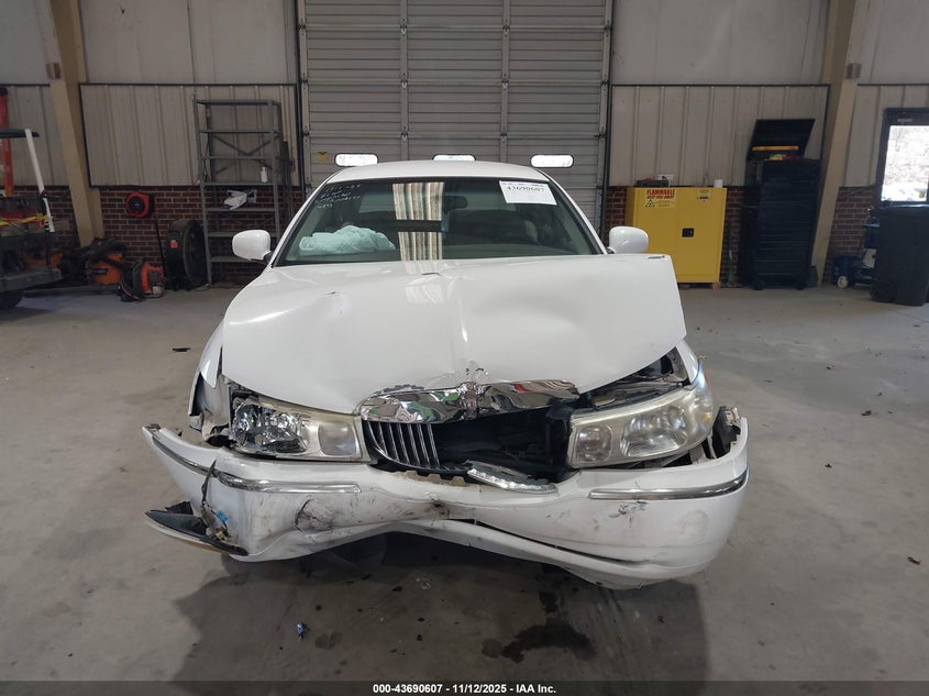 1999 Lincoln Town Car Signature VIN: 1LNHM82W5XY664843 Lot: 43690607