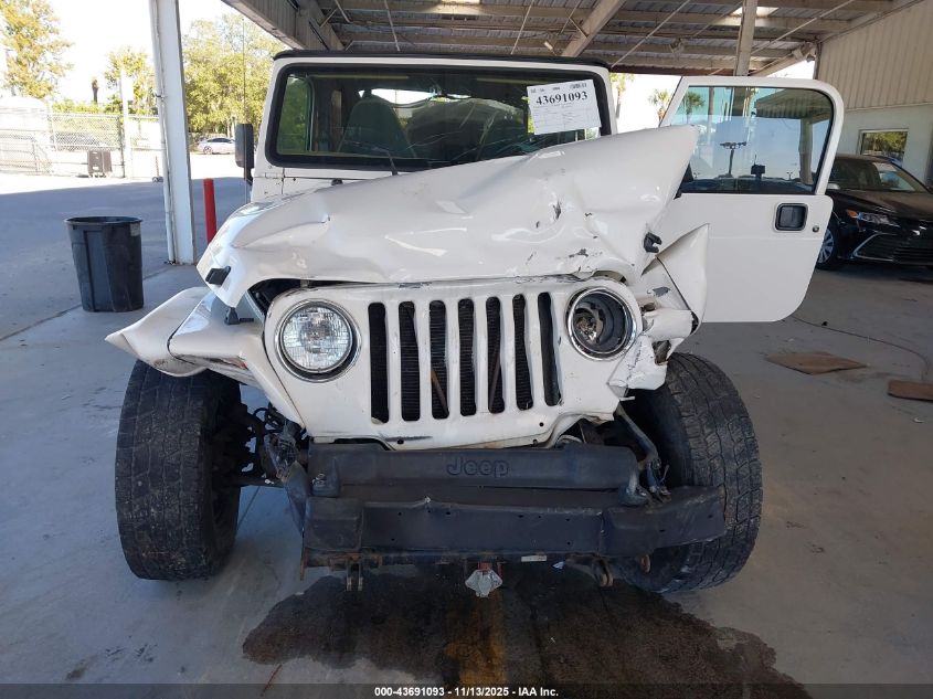 2002 Jeep Wrangler Sahara VIN: 1J4FA59S22P772061 Lot: 43691093