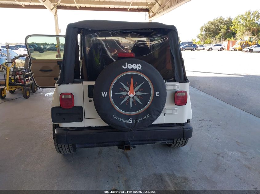 2002 Jeep Wrangler Sahara VIN: 1J4FA59S22P772061 Lot: 43691093