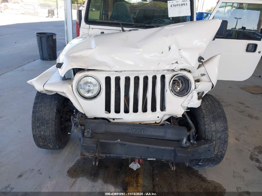 2002 Jeep Wrangler Sahara VIN: 1J4FA59S22P772061 Lot: 43691093