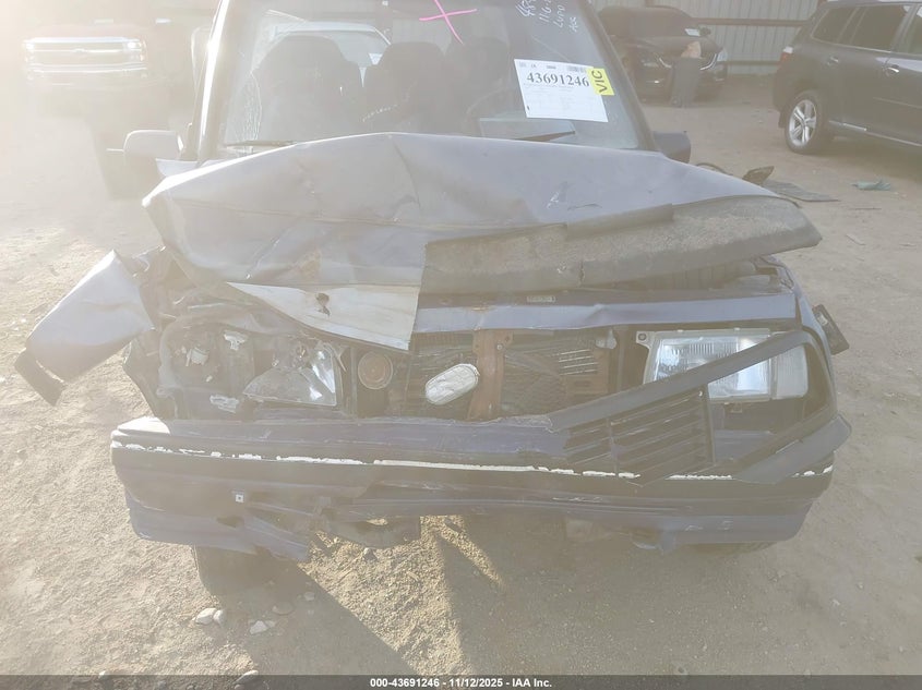 1995 Geo Tracker VIN: 2CNBJ1860S6934766 Lot: 43691246