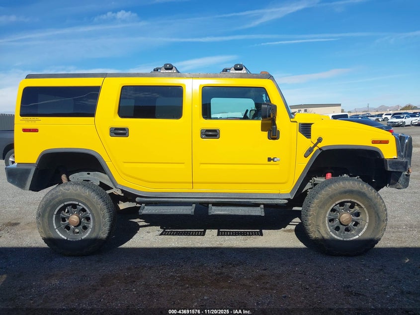 2003 Hummer H2 VIN: 5GRGN23U73H104399 Lot: 43691576