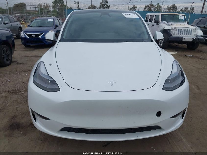 2025 Tesla Model Y Long Range Dual Motor Rear-Wheel Drive VIN: 7SAYGDED7SF229073 Lot: 43692369