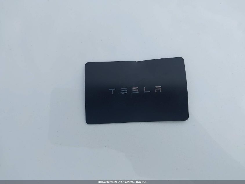 2025 Tesla Model Y Long Range Dual Motor Rear-Wheel Drive VIN: 7SAYGDED7SF229073 Lot: 43692369