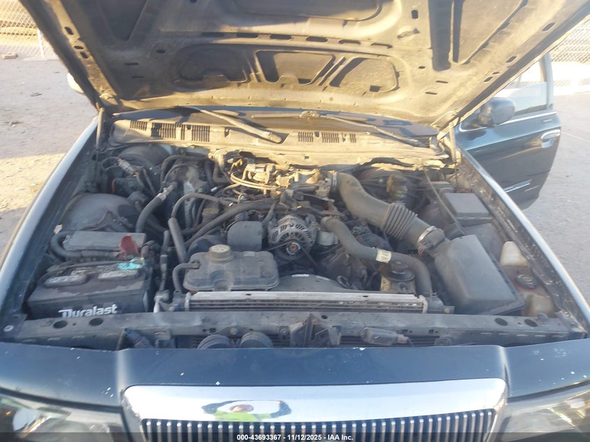 2004 Mercury Grand Marquis Gs VIN: 2MEFM74W54X611797 Lot: 43693367