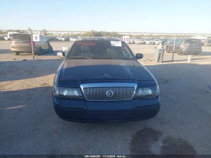 2004 Mercury Grand Marquis Gs VIN: 2MEFM74W54X611797 Lot: 43693367