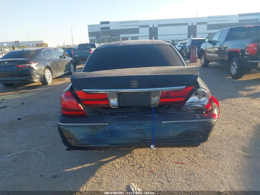 2004 Mercury Grand Marquis Gs VIN: 2MEFM74W54X611797 Lot: 43693367