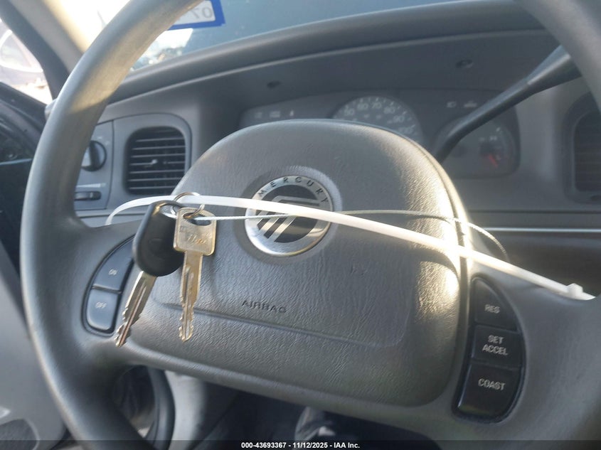 2004 Mercury Grand Marquis Gs VIN: 2MEFM74W54X611797 Lot: 43693367