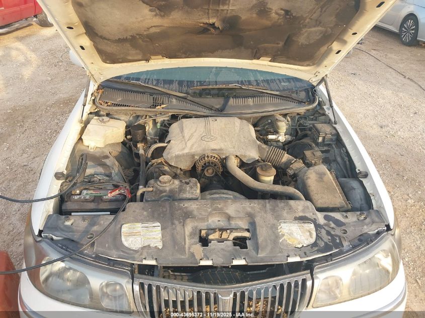 1999 Lincoln Town Car Signature VIN: 1LNHM82W9XY655949 Lot: 43695372