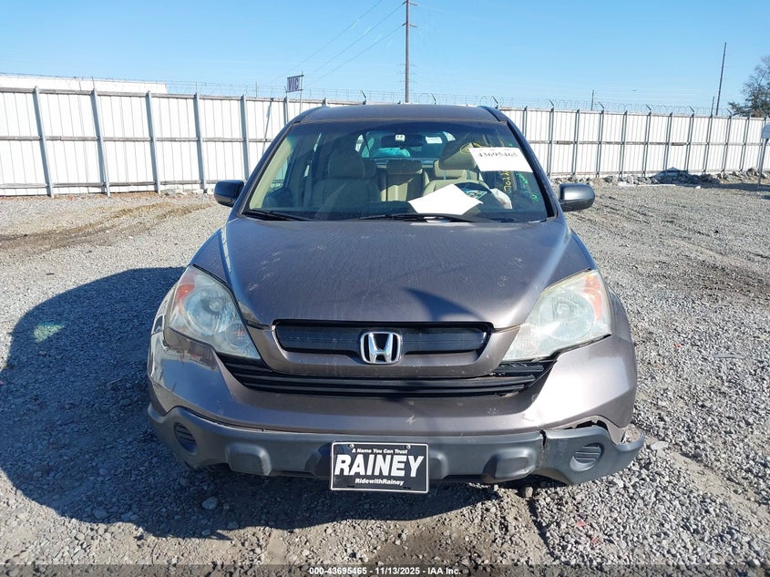 2009 Honda Cr-V Lx VIN: 3CZRE38359G702200 Lot: 43695465