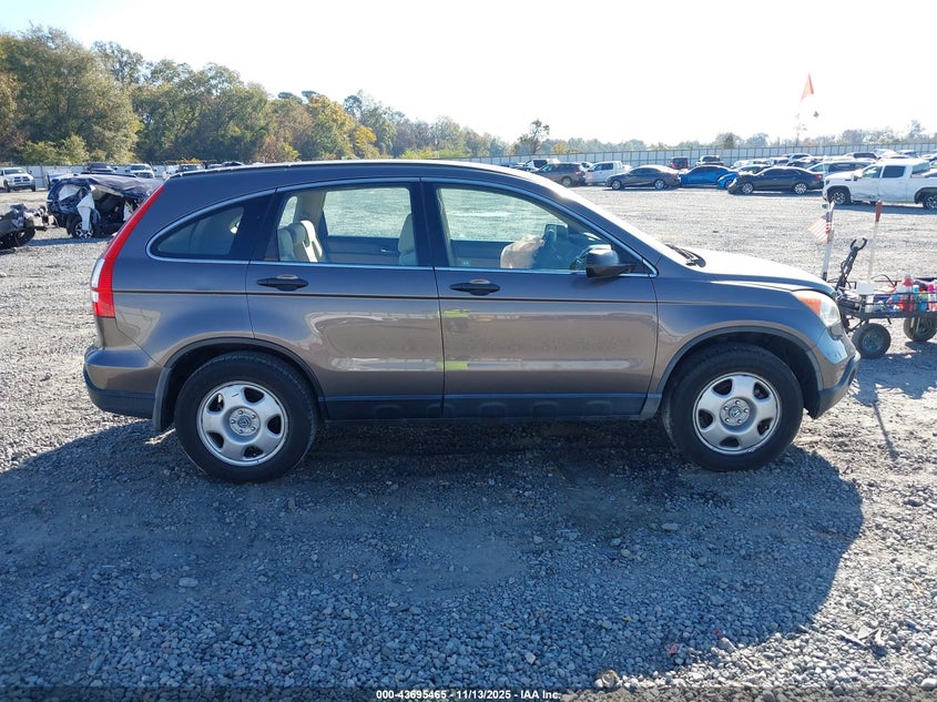 2009 Honda Cr-V Lx VIN: 3CZRE38359G702200 Lot: 43695465