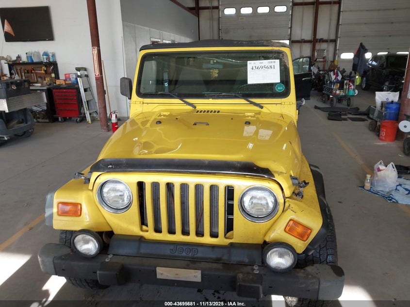 2000 Jeep Wrangler Sport VIN: 1J4FA49S5YP728459 Lot: 43695681