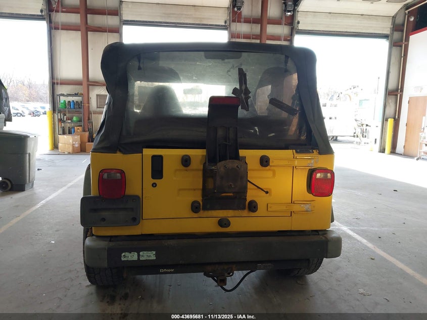 2000 Jeep Wrangler Sport VIN: 1J4FA49S5YP728459 Lot: 43695681