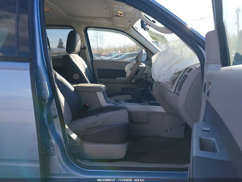 4M2CU87779KJ24765 2009 MERCURY MARINER photo no. 5