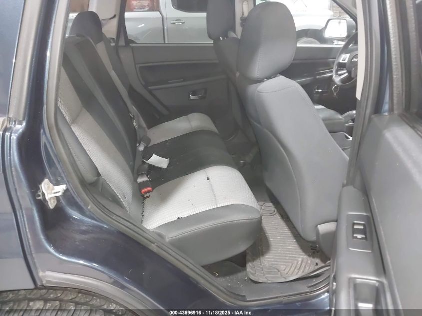 2009 Jeep Grand Cherokee Laredo VIN: 1J8GR48K79C514434 Lot: 43696916