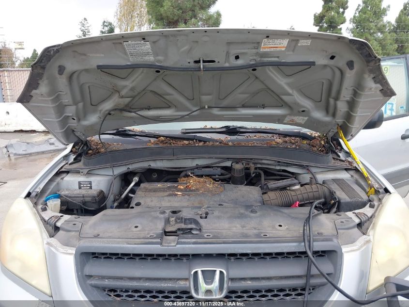 2004 Honda Pilot Lx VIN: 2HKYF181X4H614874 Lot: 43697320