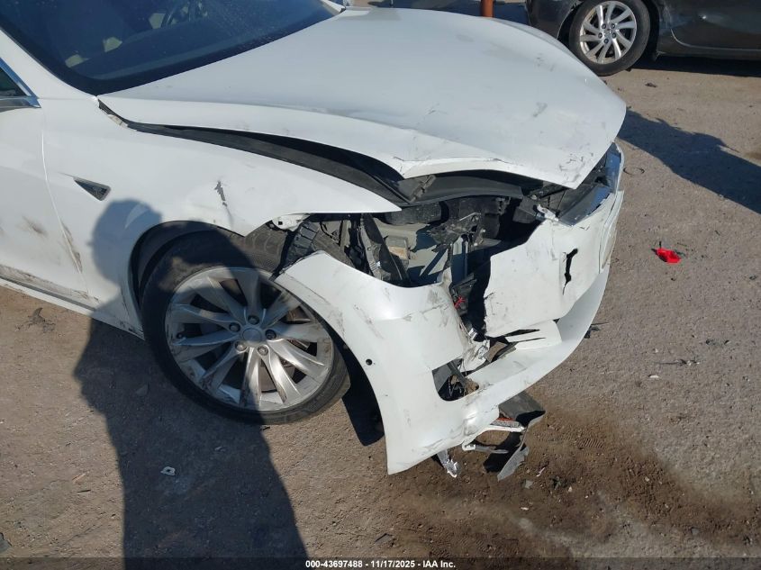 2016 Tesla Model S VIN: 5YJSA1E21GF146232 Lot: 43697488