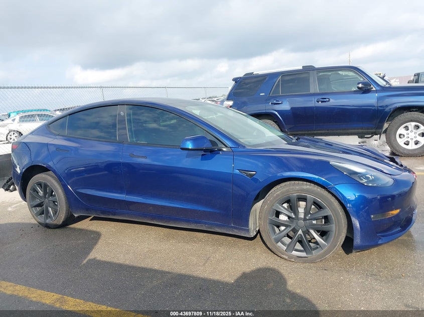 2022 Tesla Model 3 Long Range Dual Motor All-Wheel Drive VIN: 5YJ3E1EB7NF134057 Lot: 43697809