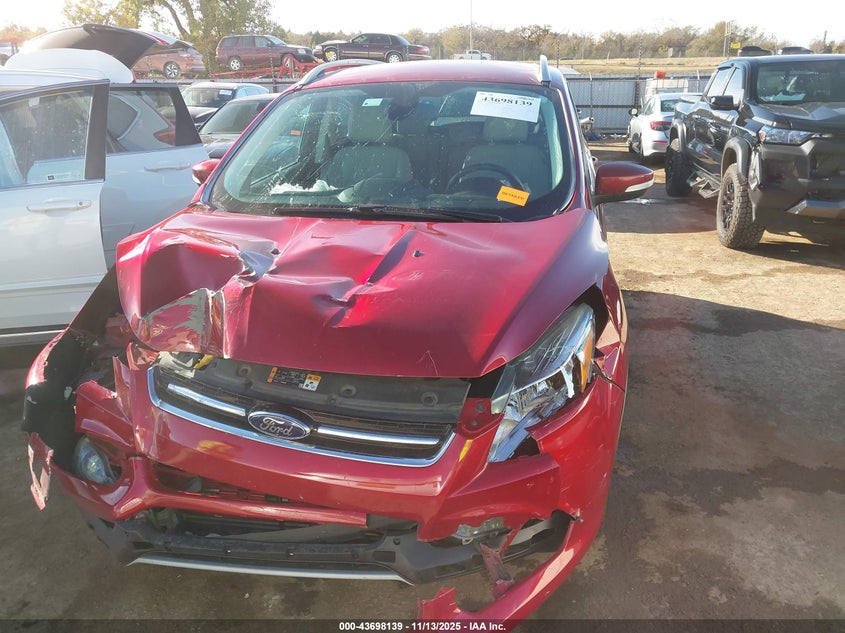 2014 Ford Escape Titanium VIN: 1FMCU0J96EUE12000 Lot: 43698139