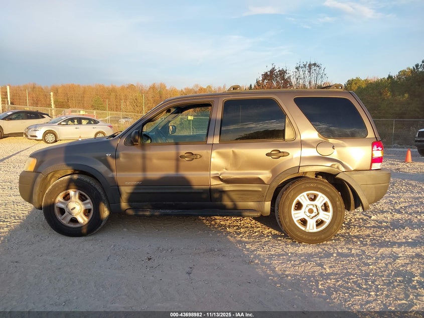2002 Ford Escape Xlt VIN: 1FMYU03112KE00910 Lot: 43698982